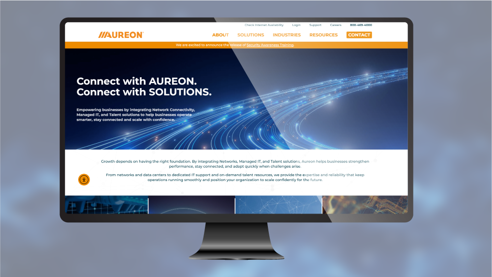 Aureon website homepage on desktop monitor